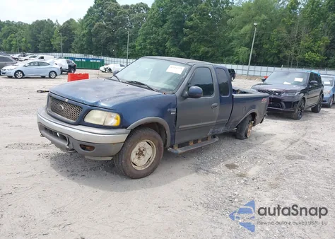 2003 Ford F-150 из США, поврежденный, VIN 1FTRX18W63XA57957